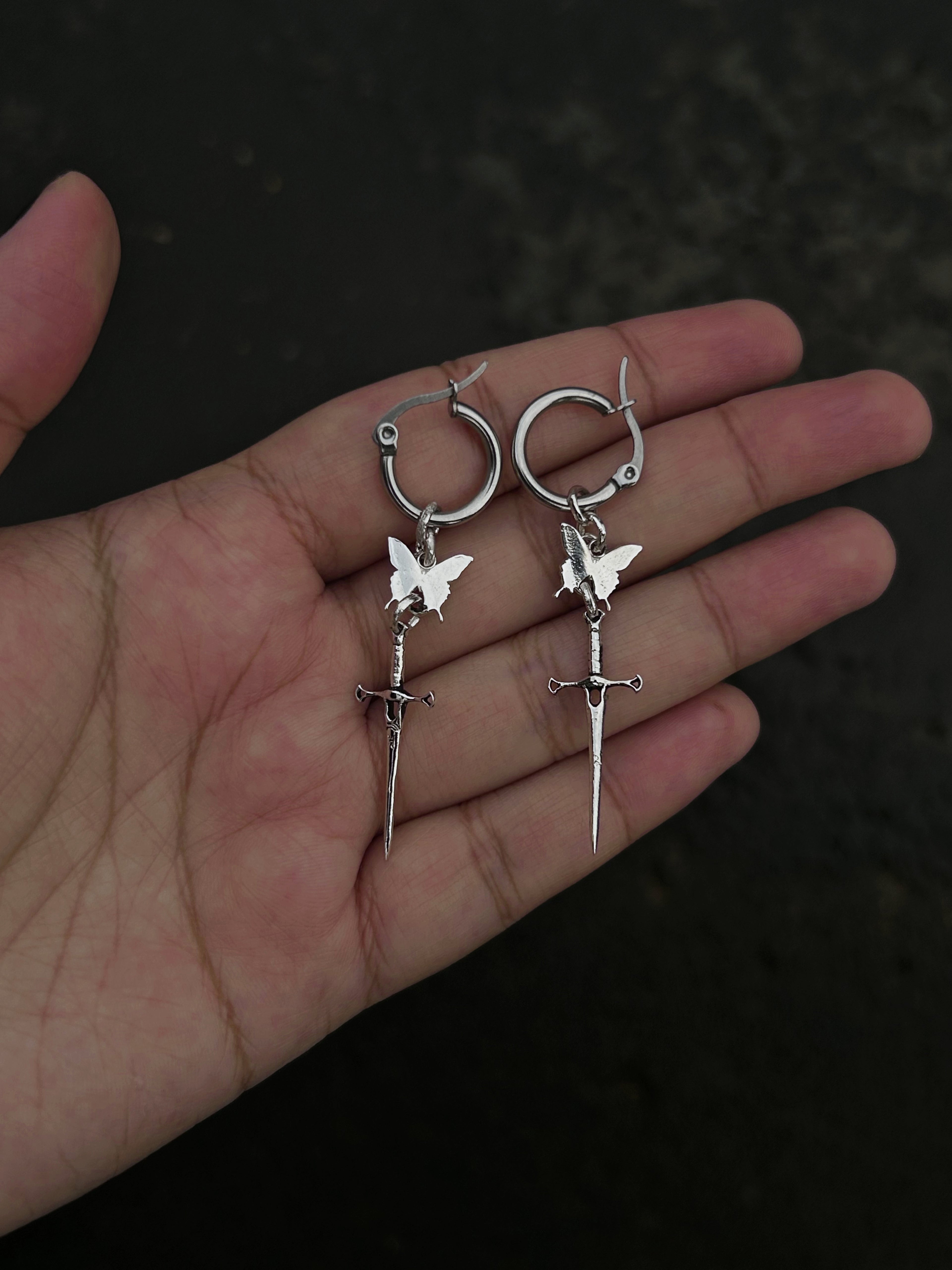 Butterfly dagger earring